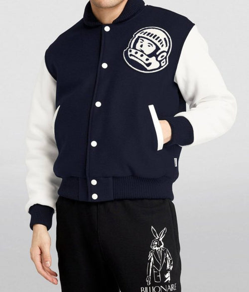 Billionaire Boys Club Astro blue and white varsity jacket with logo, modeled on person