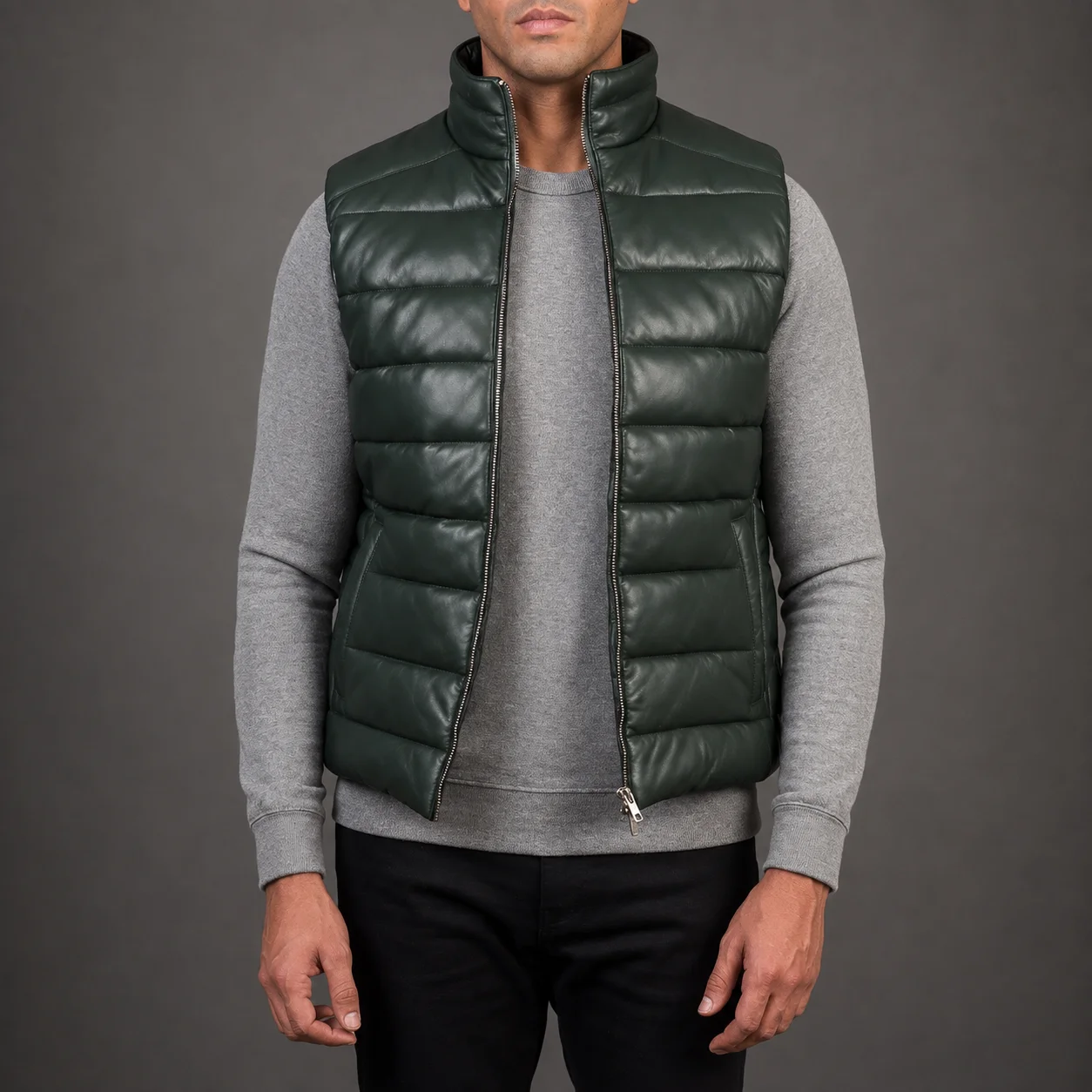 Men's Emerson green leather puffer vest crafted from premium genuine leather featuring a bold green finish, lightweight quilted insulation, modern sleeveless design, durable construction, and stylish everyday winter wear by Jonny N Guys