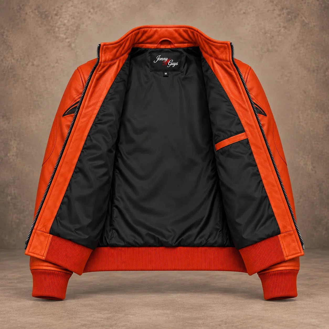 Black inner lining of orange Halloween leather bomber jacket by Jonny N Guys