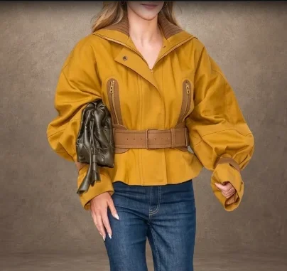 Woman wearing Jonny N Guys mustard suede aviator jacket with belt and wide collar